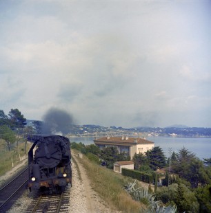 French National Railways steam locomotive no. 141-R101 leading a passenger train running from Ventimiglia to Strasbourg at Bandol, Var, France, on July 1, 1962. Photograph by Victor Hand, Hand-SNCF-XC14-15