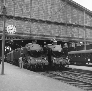 French Republic steam locomotives no. 141-TC44 and no. 141-TC2 at Paris Nord, Île-de-France, France, on June 19, 1962. Photograph by Victor Hand, Hand-SNCF-X14-052