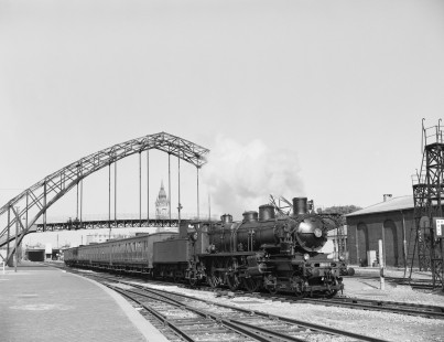 French National Railways steam locomotive no. 230-D12 pulling passenger train no. 2262 running from Calais to Hazebrouck at Calais, Pas-de-Calais, France, on July 4, 1963. Photograph by Victor Hand, Hand-SNCF-02-0181