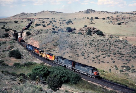 Eastbound Southern Pacific Railroad train heads downgrade after cresting Paisano summit in October of 1987. Photograph by J. Parker Lamb. Lamb-03-029-13.JPG; © 2016, Center for Railroad Photography and Art
