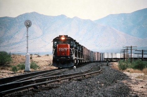 Westbound Southern Pacific Railroad freight train approaches Benson, Arizona, in July of 1989. Photograph by J. Parker Lamb. Lamb-03-030-06.JPG; © 2016, Center for Railroad Photography and Art