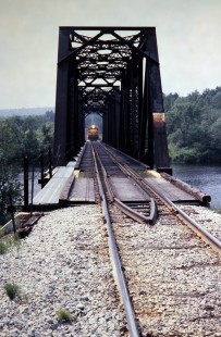Southbound Maine Central Railroad Company local crosses Androscoggin River at Gorham, New Hampshire, in June of 1980. Photograph by J. Parker Lamb. Lamb-03-037-17.JPG; © 2016, Center for Railroad Photography and Art