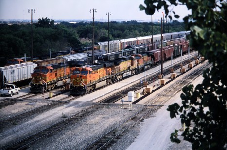 An October 2006 view of Temple holding yard shows mostly Burlington Northern and Santa Fe Railway units on three north/west bound trains. Photograph by J. Parker Lamb. © 2016, Center for Railroad Photography and Art