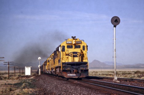 Eastbound Atchison, Topeka and Santa Fe Railway coal train approaches Lordsburg, New Mexico (on Southern Pacific rails) in July of 1991. Photograph by J. Parker Lamb. Lamb-03-033-15.JPG; © 2016, Center for Railroad Photography and Art