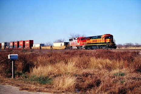 Houston-bound Burlington Northern and Santa Fe Railway intermodal train on mainline south of Temple, Texas, in December of 2001. Photograph by J. Parker Lamb. Lamb-03-036-16.JPG; © 2016, Center for Railroad Photography and Art