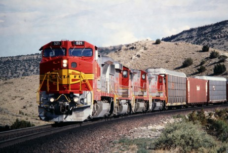 Westbound Atchison, Topeka and Santa Fe Railway intermodal train enters Abo Canyon en route from Mountainaire to Belen, New Mexico, in May of 1991. Photograph by J. Parker Lamb. © 2016, Center for Railroad Photography and Art