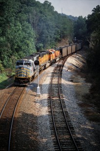 A northbound BNSF Railway coal train led by Kansas City Southern locomotive no. 1616 plows through forest near Jasper, Alabama, in October 2006 (ex SLSF line). Photograph by J. Parker Lamb. Lamb-03-036-20.JPG; © 2016, Center for Railroad Photography and Art