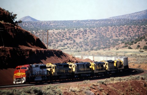 Eastbound Atchison, Topeka and Santa Fe Railway trailers on flatcars (TOFC) climbs steep grade toward Mountainair, New Mexico, in July of 1991. Photograph by J. Parker Lamb. Lamb-03-034-14.JPG; © 2016, Center for Railroad Photography and Art