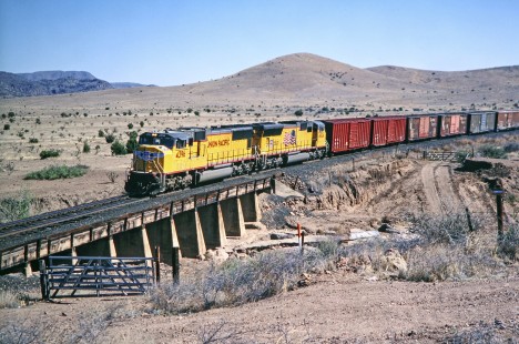 Union Pacific Railroad locomotive no. 4396 and no. 4924 lead westbound manifest headed for Paisano Pass, Texas, in April of 2003. Photograph by J. Parker Lamb. Lamb-03-041-07.JPG; © 2016, Center for Railroad Photography and Art