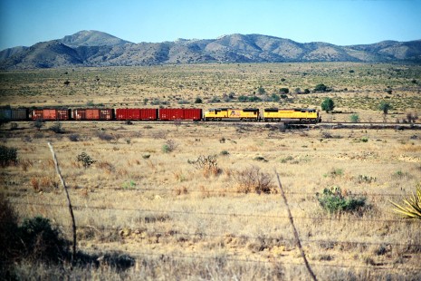 Union Pacific Railroad locomotive no. 4396 leads westbound manifest near Marathon, Texas, in April of 2003. Photograph by J. Parker Lamb. Lamb-03-040-11.JPG; © 2016, Center for Railroad Photography and Art