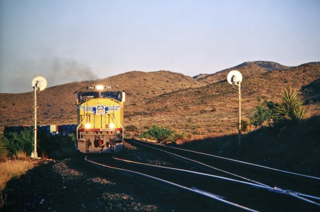 Union Pacific Railroad no. 3918 westbound intermodal approaches Alpine Texas, April 2003. Photograph by J. Parker Lamb. Lamb-03-040-19.JPG; © 2016, Center for Railroad Photography and Art