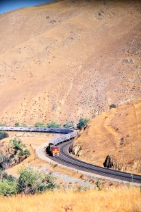 An eastbound Burlington Northern and Santa Fe Railway freight train approaches Caliente, an unincorporated community in Kern county, California, in October of 2001. Photograph by J. Parker Lamb. Lamb-03-045-15.JPG; © 2016, Center for Railroad Photography and Art