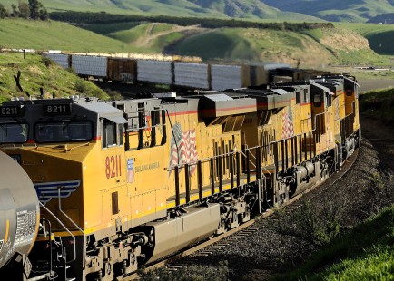 At Sand Cut, modern distributed power of a Union Pacific freight train makes its way into Bena, California, in January 2016. 

Read more about the 2020 John E. Gruber Creative Photography Awards Program: <a href="http://www.railphoto-art.org/connections-2020/" rel="noreferrer nofollow">www.railphoto-art.org/connections-2020/</a>