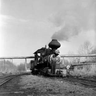 An Argent Lumber Company worker with one of the company's wood-burning steam locomotives just outside of Hardeeville, South Carolina, in the early months of 1956. Photograph by Jim Shaughnessy. © 2021, Center for Railroad Photography and Art. Shaughnessy-N-ARGENT-0049