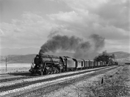 Turkish State Railways 56368 leads a freight train north on the Ulukisla-Kaysseri Line near Kardeşgediği, Turkey, on September 13, 1973. The locomotive is a 2-10-0 "Skyliner" built by the Vulcan Foundry in Wilkes-Barre, Pennsylvania. Photograph by Victor Hand, Collection of the Center for Railroad Photography & Art, Hand-TCDD-25-125