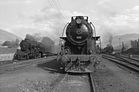 Three Turkish State Railways steam locomotives in Ulukışla, Turkey, on September 13, 1973. They include 45153, a 2-8-0 built in the United Kingdom, and 56368, a 2-10-0 built in the United States. Photograph by Victor Hand, Collection of the Center for Railroad Photography & Art, Hand-TCDD-25-118