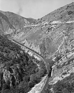 A Turkish State Railways freight train steams south through the rugged countryside along the Zonguldak Line near İsmetpaşa, Turkey, on September 17, 1973. Photograph by Victor Hand, Collection of the Center for Railroad Photography & Art, Hand-TCDD-25-184