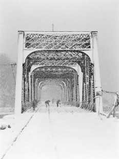 Spuyten Duyvil in the Bronx, as the maintainer crew swept around the lift rails of the swing bridge during one of the biggest March snowstorms in New York City history. March 5, 1981