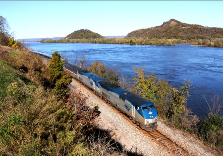 Amtrak's Empire Builder #8 south of Winona, MN moving along Mississippi River across from Wisconsin's Perrot State Park. October 18, 2018