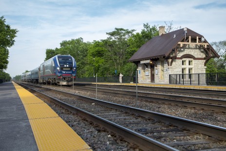 A new Seimens Charger locomotive leads train 383, the <i>Illinois Zephyr</i>, past Highlands Station in Hinsdale, Illinois, on June 6, 2019. Photograph by Todd Halamka, a board member of the Center for Railroad Photography & Art