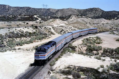 The <i>Desert Wind</i> crosses Cajon Pass in southern California on April 27, 1991. The train operated between Ogden, Utah, and Los Angeles, via Las Vegas, from 1979 until 1997. Photograph by Ronald C. Hill, collection of the Center for Railroad Photography & Art, Hill-01-24-32