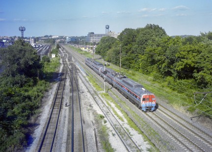 <i>Metroliner</i> train 117 from New York City arrives in Washington, D.C., on July 30, 1981. The train consists of two pairs of Budd electric cars built for the Pennsylvania and Penn Central railroads between 1967 and 1970. They were fully replaced in <i>Metroliner</i> service before the end of the year by new AEM-7 electric locomotives pulling regular coaches. Photograph by Victor Hand, collection of the Center for Railroad Photography & Art, Hand-AM-C59-058
