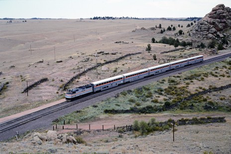 Amtrak's <i>Pioneer</i>, which ran from 1977 until 1997, is near the continental divide at Dale Junction, Wyoming, on August 14, 1992. For its final six years of operation, the train ran between Denver and Seattle via Wyoming, Idaho, and Oregon. Photograph by Ronald C. Hill, collection of the Center for Railroad Photography & Art, Hill-02-03-13