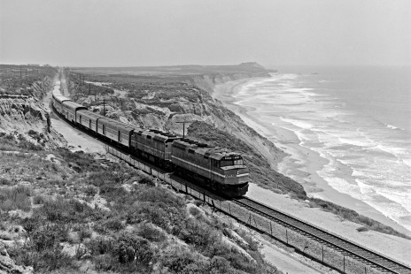 Following the Pacific Ocean not far out of Los Angeles, the <i>Coast Starlight</i> passes the deserted beach near Jalama on its way to Seattle on June 19, 1984. Photograph by Victor Hand, collection of the Center for Railroad Photography & Art, Hand-AM-59-416