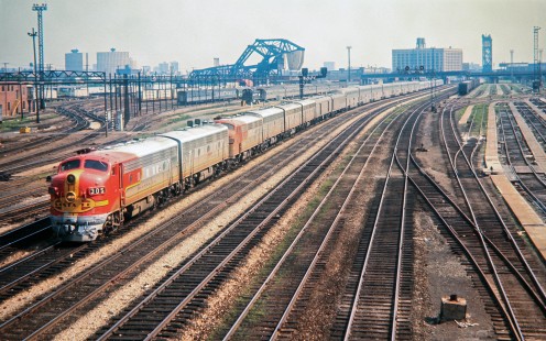 Amtrak was barely two months old when the combined <i>Super Chief / El Capitan </i> rolled into Chicago on July 4, 1971, looking for all the world like the Santa Fe train that it had been prior to May 1. The train was renamed the <i>Southwest Limited</i> in 1974 and the <i>Southwest Chief</i> in 1981. The Superliner cars that predominate on long-distance Amtrak trains today were based on the Santa Fe's bi-level cars like the ones on this train. Photograph by John F. Bjorklund, collection of the Center for Railroad Photography & Art, Bjorklund-04-04-01