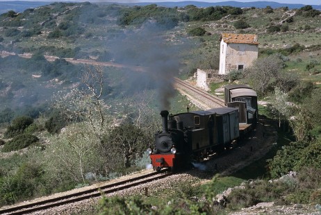 Ferrovie della Sardegna (Railways of Sardinia) steam locomotive no. 43 hauls freight south of Sanicidano in Sardinia, Italy, on April 7, 2002. Photograph by Katherine Botkin. BOTKINK-106-KT-08, © 2002, Katherine Botkin