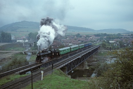Căile Ferate Român steam locomotive no. 231 leads southbound passenger train at Tălmaciu, Sibiu County, Romania, on September 28, 1996. Photograph by Katherine Botkin. BOTKINK-110-KT-01, © 1996, Katherine Botkin