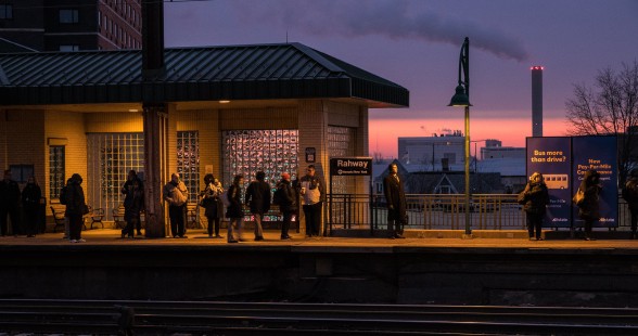 Commuters wait at Rahway Station at dawn in Rahway, New Jersey, on January 16, 2019.

Judges' comments: Waiting passengers, platforms, and trains encapsulate the story of this winning submission. Intrigued by the photographer’s use of time of day and season juxtaposed across a theater of personalities waiting for the next train, the judges noted this series delivers a fascinating story of urban commuting. The winter scene of bundled passengers looking toward an arriving predawn train to New York City chills the senses, while the foggy summer Chicago sunrise at the Roosevelt CTA Station reminds the viewer how just a silhouette and pose can speak volumes about people without ever showing their facial expressions. The third, autumn image reminds the viewer that multi-modal, bi-level transfer platforms offer yet again another unique image-making opportunity. 

Read more about the 2021 John E. Gruber Creative Awards Program: <a href="https://railphoto-art.org/awards/2021-awards/" rel="noreferrer nofollow">railphoto-art.org/awards/2021-awards/</a>