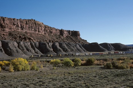 Atchison, Topeka and Santa Fe Railway diesel locomotive no. 5028 hauls westbound freight near Mesita, New Mexico, on October 11, 1985. Photograph by William Botkin, BOTKINW-15-WT-177 © 1985, William Botkin.