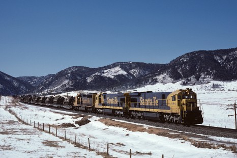 Atchison, Topeka and Santa Fe Railway diesel locomotive no. 8101 leads freight train northbound at Palmer Lake, Colorado, on March 1, 1985. eastbound freight at Caliente, California, on September 26, 1974. Photograph by William Botkin, BOTKINW-15-WT-133 © 1985, William Botkin.