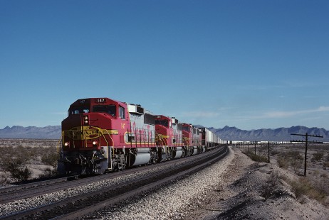 Atchison, Topeka and Santa Fe Railway diesel locomotive no. 147 leads a westbound freight train near Bannock, California, on December 3, 1990. Photograph by William Botkin, BOTKINW-15-WT-331 © 1990, William Botkin.