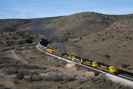 Atchison, Topeka and Santa Fe Railway diesel locomotive no. 8161 leads eastbound freight train at Crozier Canyon, west of Truxton, Arizona, on December 13, 1986. Photograph by William Botkin, BOTKINW-15-WT-254 © 1986, William Botkin.
