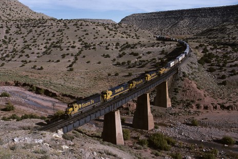 Atchison, Topeka and Santa Fe Railway diesel locomotive no. 5376 leads westbound freight train at Abo Canyon, east of Sais, New Mexico, on October 13, 1985. Photograph by William Botkin, BOTKINW-15-WT-213 © 1985, William Botkin.