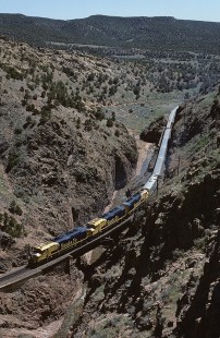 Atchison, Topeka and Santa Fe Railway diesel locomotive no. 5911 leads eastbound passenger train, the "Director's Special," though Apache Canyon in New Mexico, on April 23, 1985. Photograph by William Botkin, BOTKINW-15-WT-171 © 1985, William Botkin.