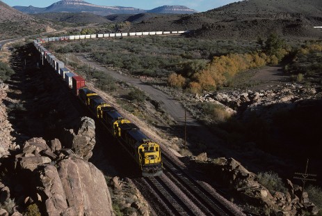 Atchison, Topeka and Santa Fe Railway diesel locomotive no. 6410 leads westbound freight train east of Valentine, Arizona, on November 4, 1994. Photograph by William Botkin, BOTKINW-15-WT-353 © 1990, William Botkin.