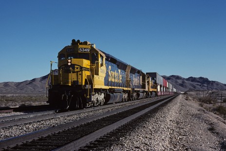 Atchison, Topeka and Santa Fe Railway diesel locomotive no. 5349 leads westbound freight train near Ibis, California, on December 3, 1990. Photograph by William Botkin, BOTKINW-15-WT-339 © 1990, William Botkin.