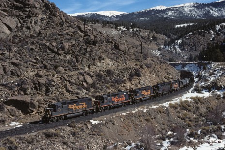 Denver and Rio Grande Western Railroad diesel locomotive nos. 3115 and 3134 haul westbound freight train no. 149 at Granite, Colorado, on February 24, 1990. Photograph by William Botkin, BOTKINW-8-WT-1152 © 1990, William Botkin.


BOTKINW-8-WT-1152 3115 WB train 149 Granite CO 24 Feb 90 WE Botkin
