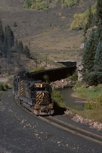 Denver and Rio Grande Western Railroad locomotive nos. 3114 and 3087 haul eastbound coal at Pando, Colorado, in September, 1977. Photograph by William Botkin, BOTKINW-8-WT-461 © 1977, William Botkin.