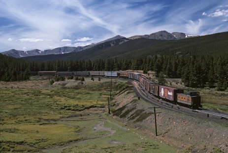 Denver and Rio Grande Western Railroad caboose at the end of an eastbound coal train at Mitchell, Colorado, on August 18, 1974. Photograph by William Botkin, BOTKINW-8-WT-159 © 1974, William Botkin.