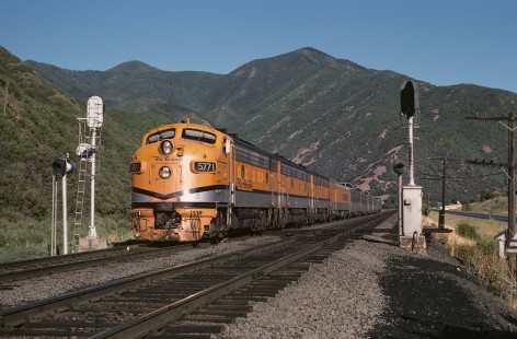 Denver and Rio Grande Western Railroad locomotive no. 5771 leads Rio Grande Zephyr no. 18 at Castilla-Rio, Utah, on July 28, 1974. Photograph by William Botkin, BOTKINW-8-WT-113 © 1974, William Botkin.