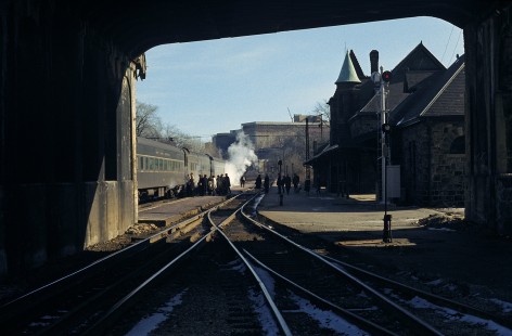 New York Central westbound Detroit to Chicago no. 17 makes a station stop at Ann Arbor, Michigan in Jan 1968 just one month prior to the merger with the Pennsylvania Railroad that created the Penn Central. Photograph by William Botkin, BOTKINW-10-WT-61 © 1968, William Botkin.
