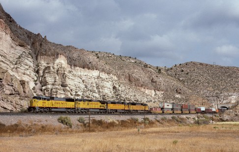 Union Pacific Railroad locomotive no. 6184 hauls westbound freight west of Caliente, Nevada, at 9:45 am, on October 29, 1992. Photograph by William Botkin, BOTKINW-19-WT-520 © 1992, William Botkin.
