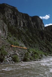 Denver and Rio Grande Western Railroad locomotive no. 5771 leads Rio Grande Zephyr no. 18 at Glenwood Canyon, Colorado, on June 15, 1975. Photograph by William Botkin, BOTKINW-8-WT-315 © 1975, William Botkin.