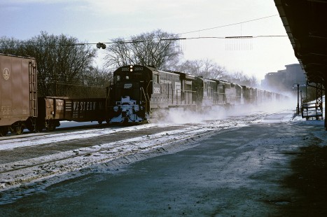 Penn Central LS-3 kicks up snow as it passes westbound through Ann Arbor, Michigan headed by U30B 2892 on January 12, 1969.  Photograph by William Botkin, BOTKINW-10-WT-180 © 1969, William Botkin.