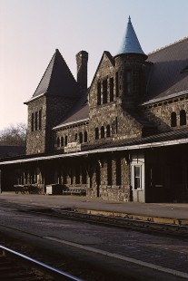 The imposing Ann Arbor, Michigan depot was built for the Michigan Central Railroad in 1886 of cut stone.  The depot was used as a passenger depot by the New York Central and Penn Central until 1970 when the Railroad sold the structure to a restauranteur who transformed it into a high-end seafood restaurant. Photograph by William Botkin, BOTKINW-10-WT-242 © 1970, William Botkin.