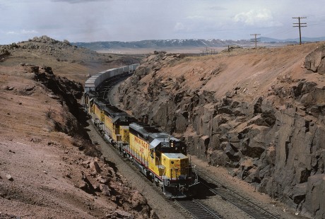 Union Pacific Railroad locomotive no. 3455 hauls eastbound freight at Hermosa, Wyoming, at 11:20 am on April 11, 1985. Photograph by William Botkin, BOTKINW-19-WT-405 © 1985, William Botkin.